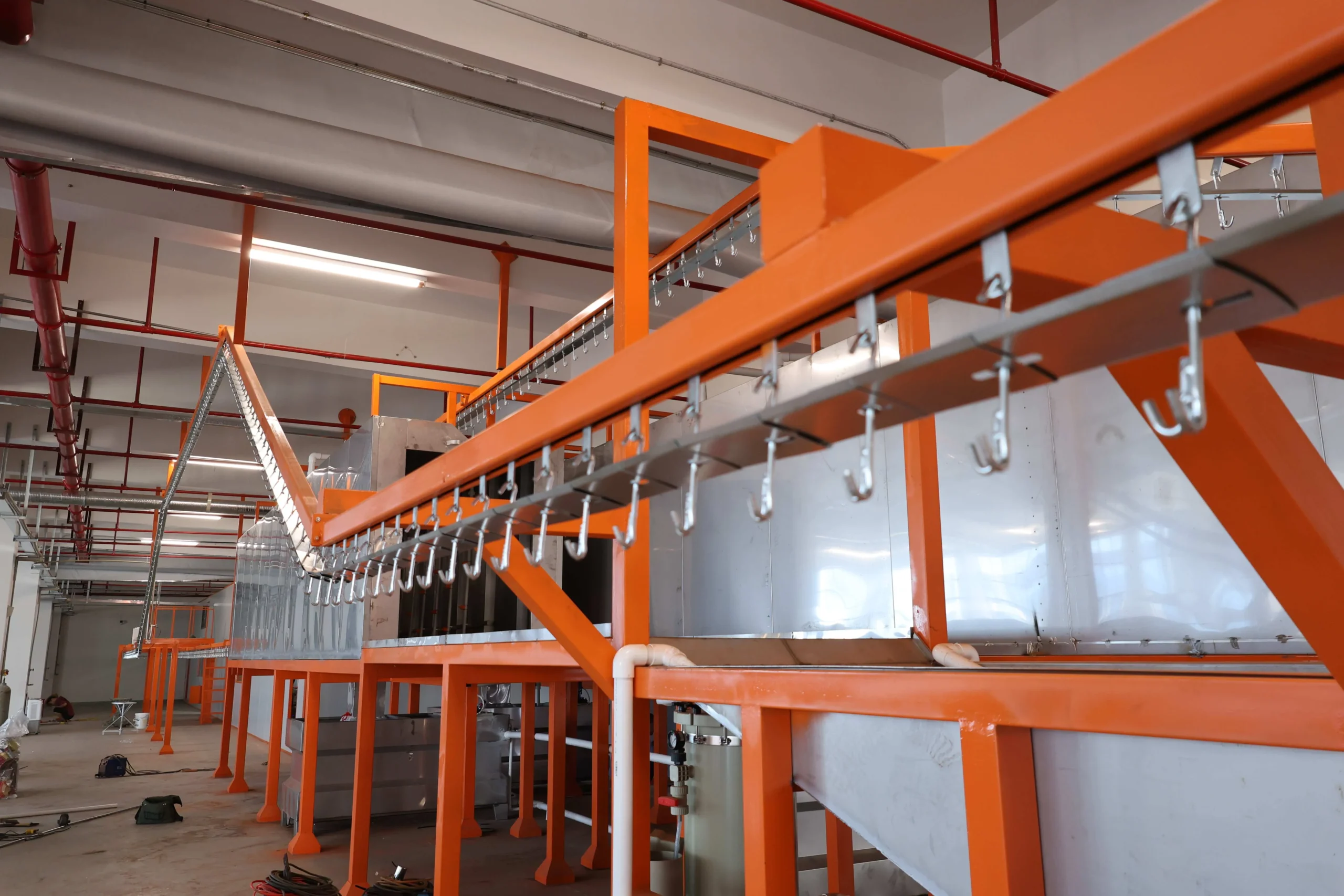 Conveying system for machinery powder coating production